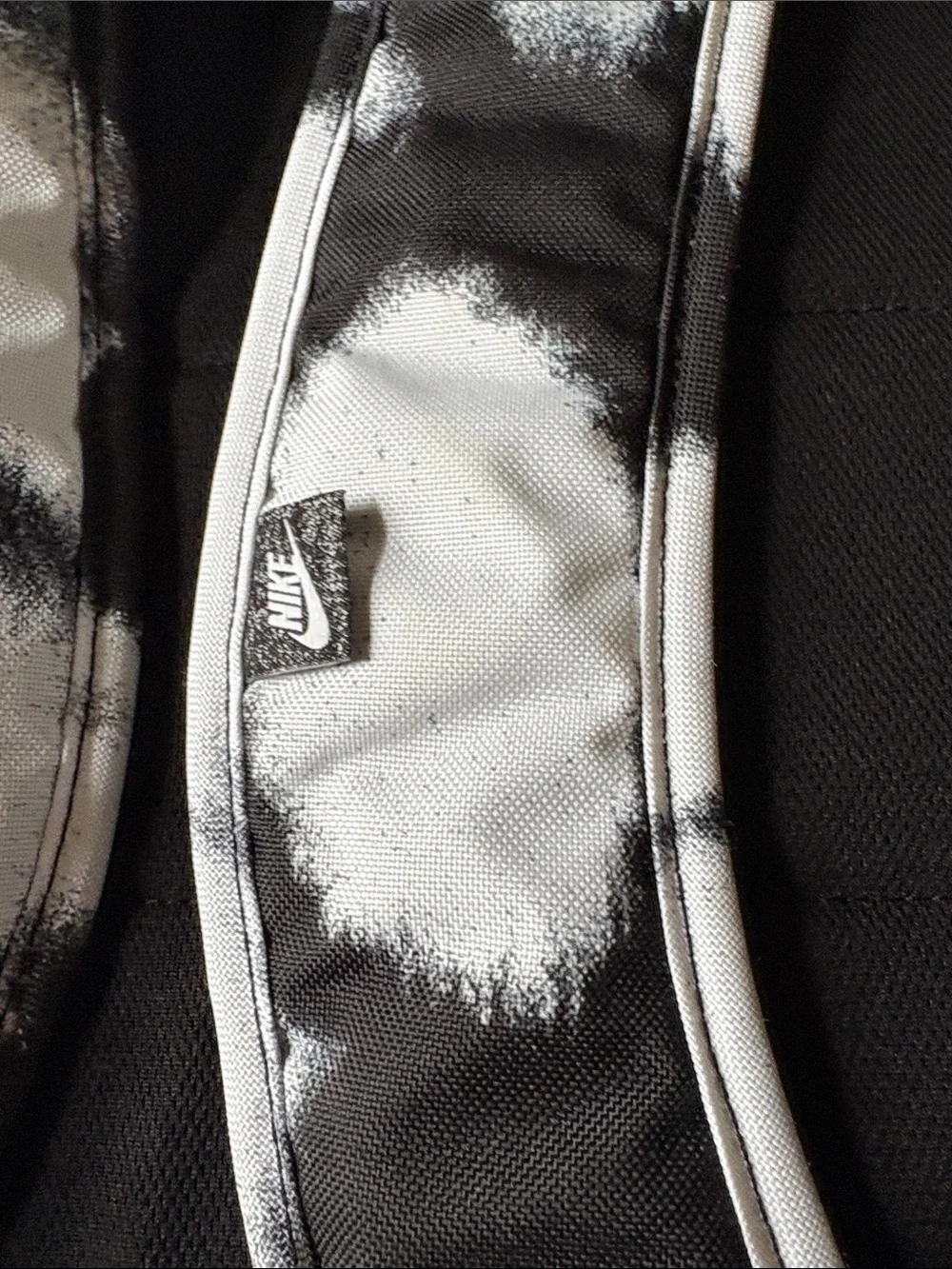 Nike Black & White Graphic Backpack with Red Swoosh